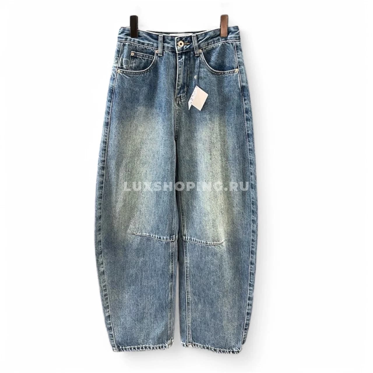 Loewе джинсы в винтажном стиле, с эффектом стирки, в светло-голубом дениме.