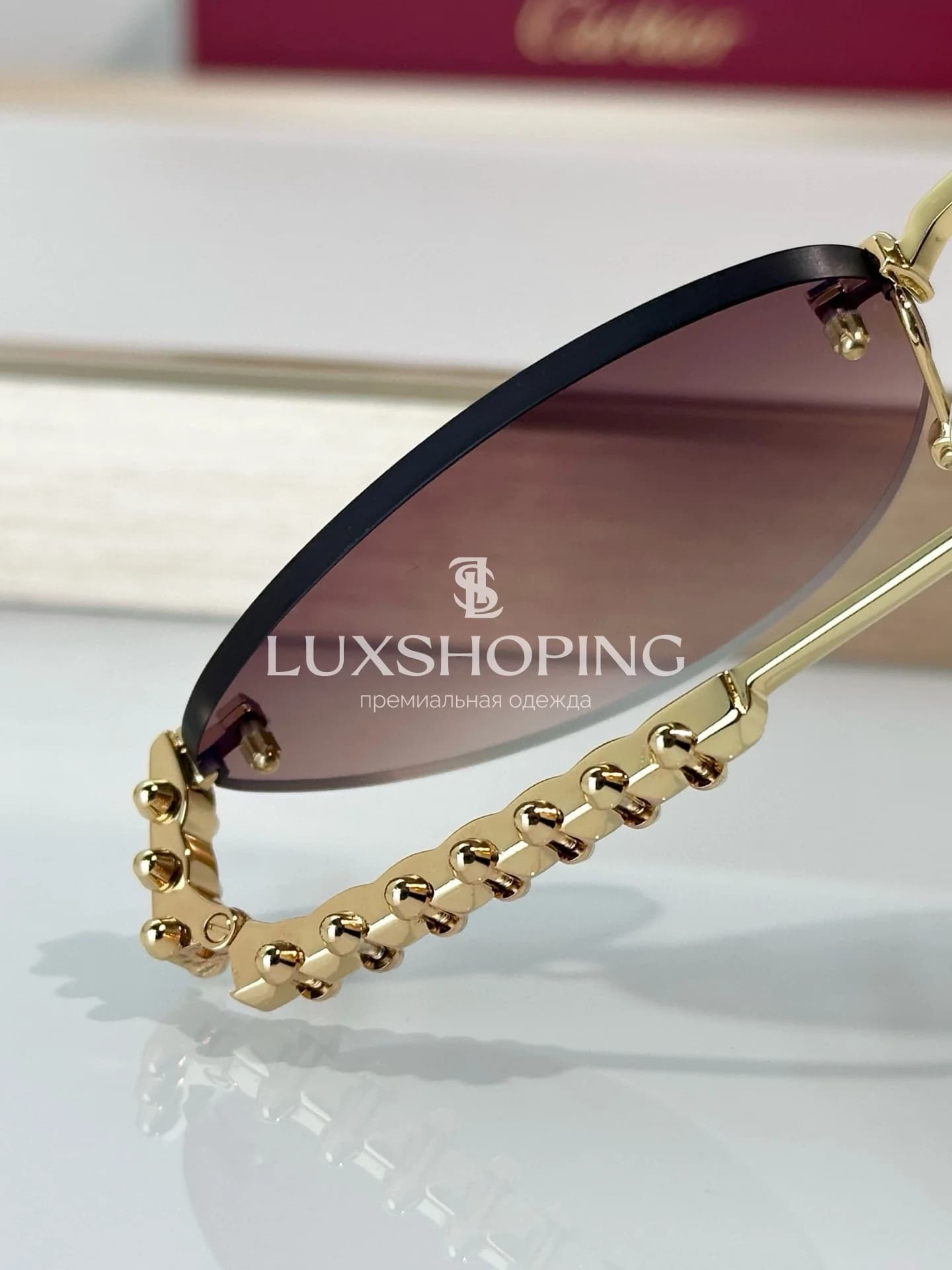 Солнцезащитные очки Cartier CT0543S 01 - фото 11