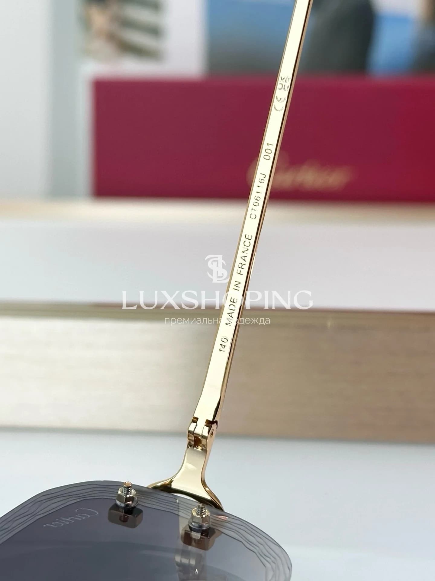 Очки Cartier CT06116J с фотохромными линзами и узором на линзе - фото 15