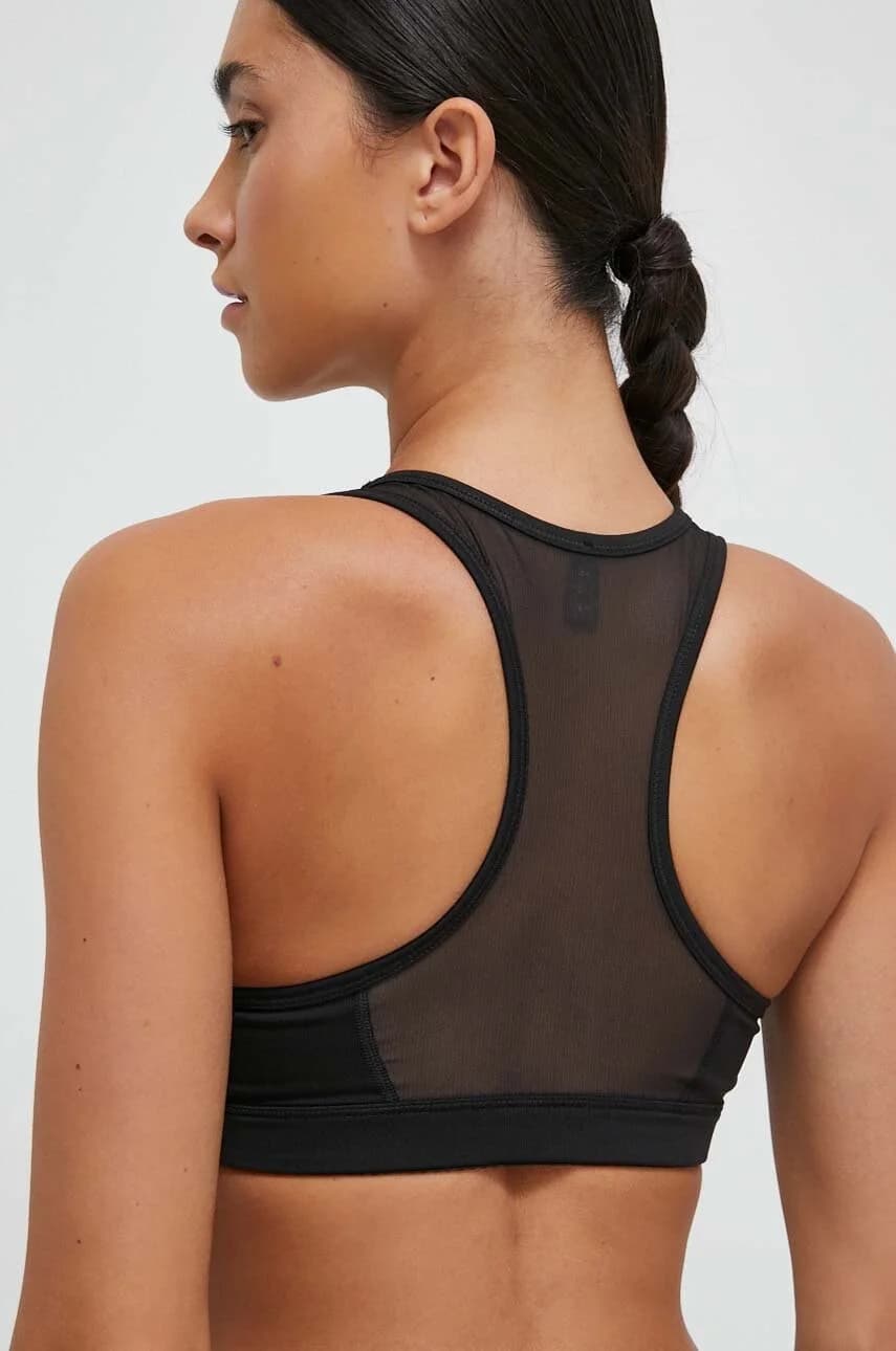 4Сохраняет спортивный бюстгальтер - фото 3