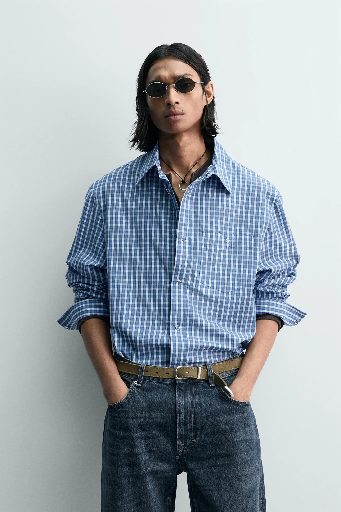 РУБАШКА СВОБОДНОГО КРОНА В КЛЕТИКУ, ОГРАНИЧЕННАЯ ВЫПУСКА