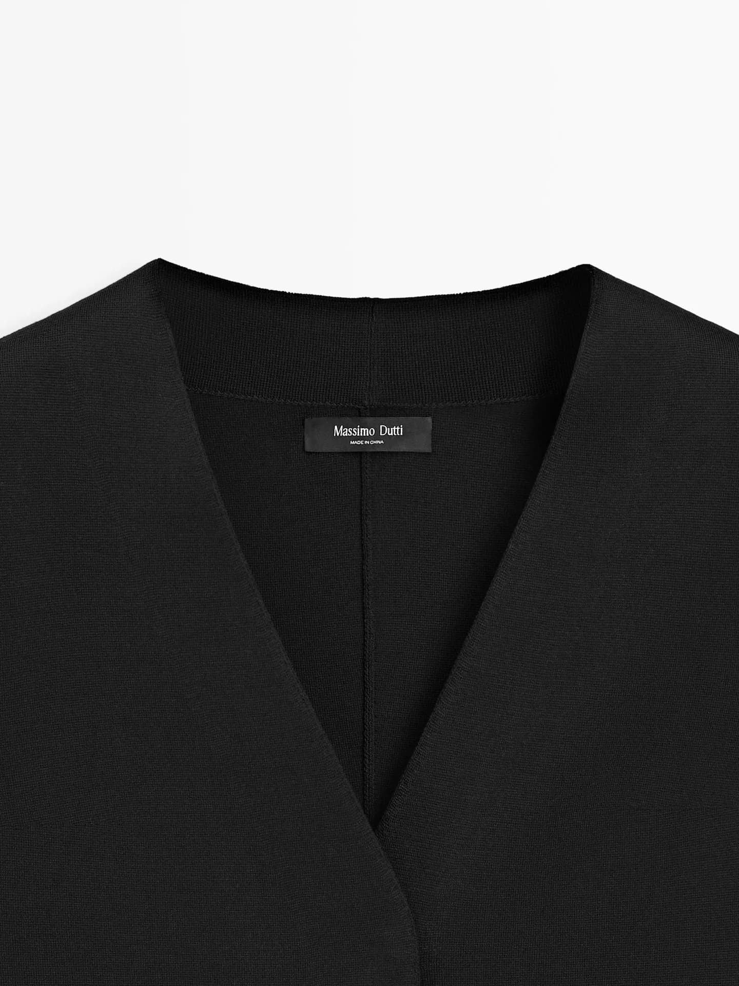 Вязаный пиджак с V-образным вырезом и молнией. - фото 3