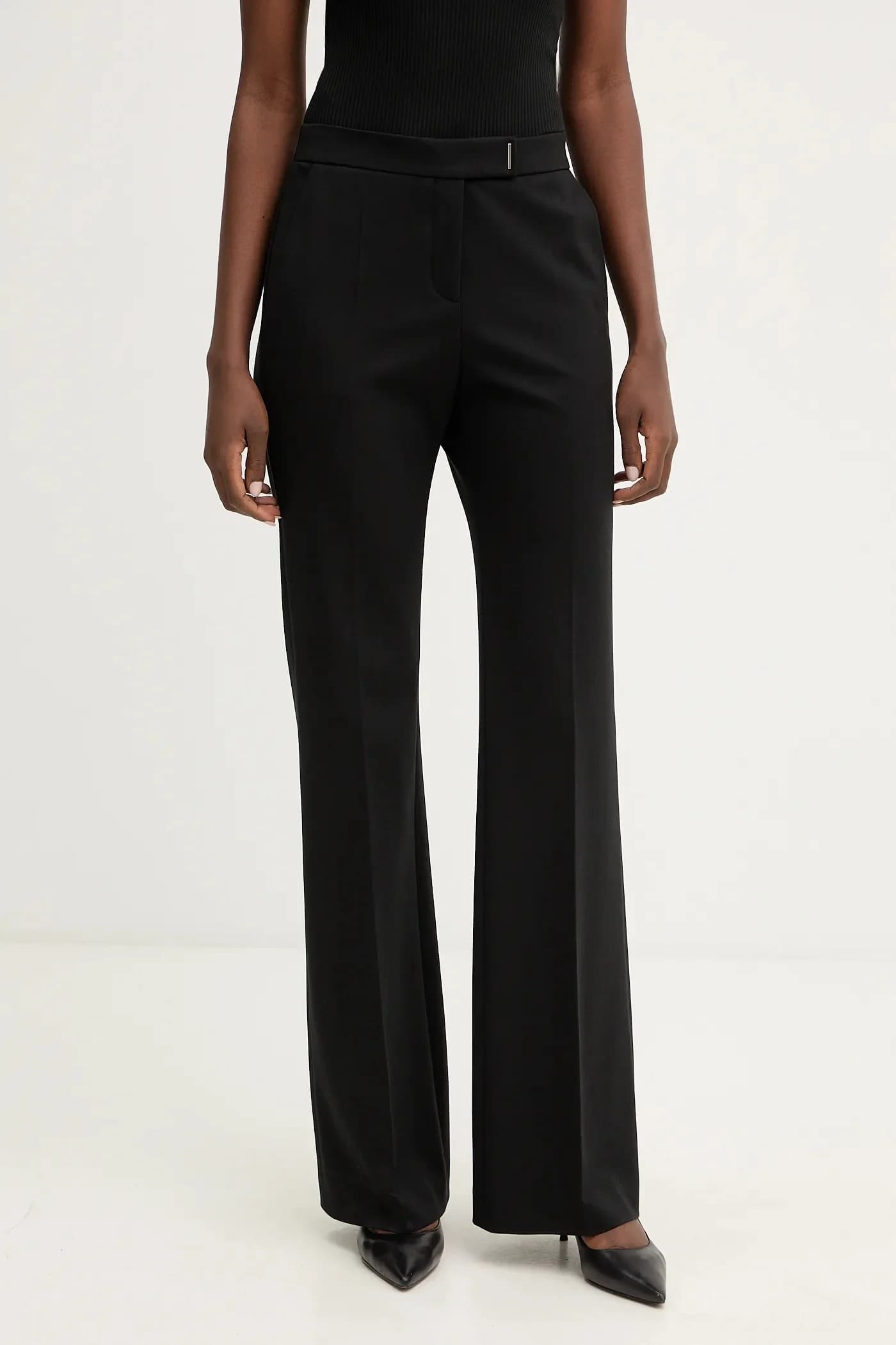 Брюки на талии4