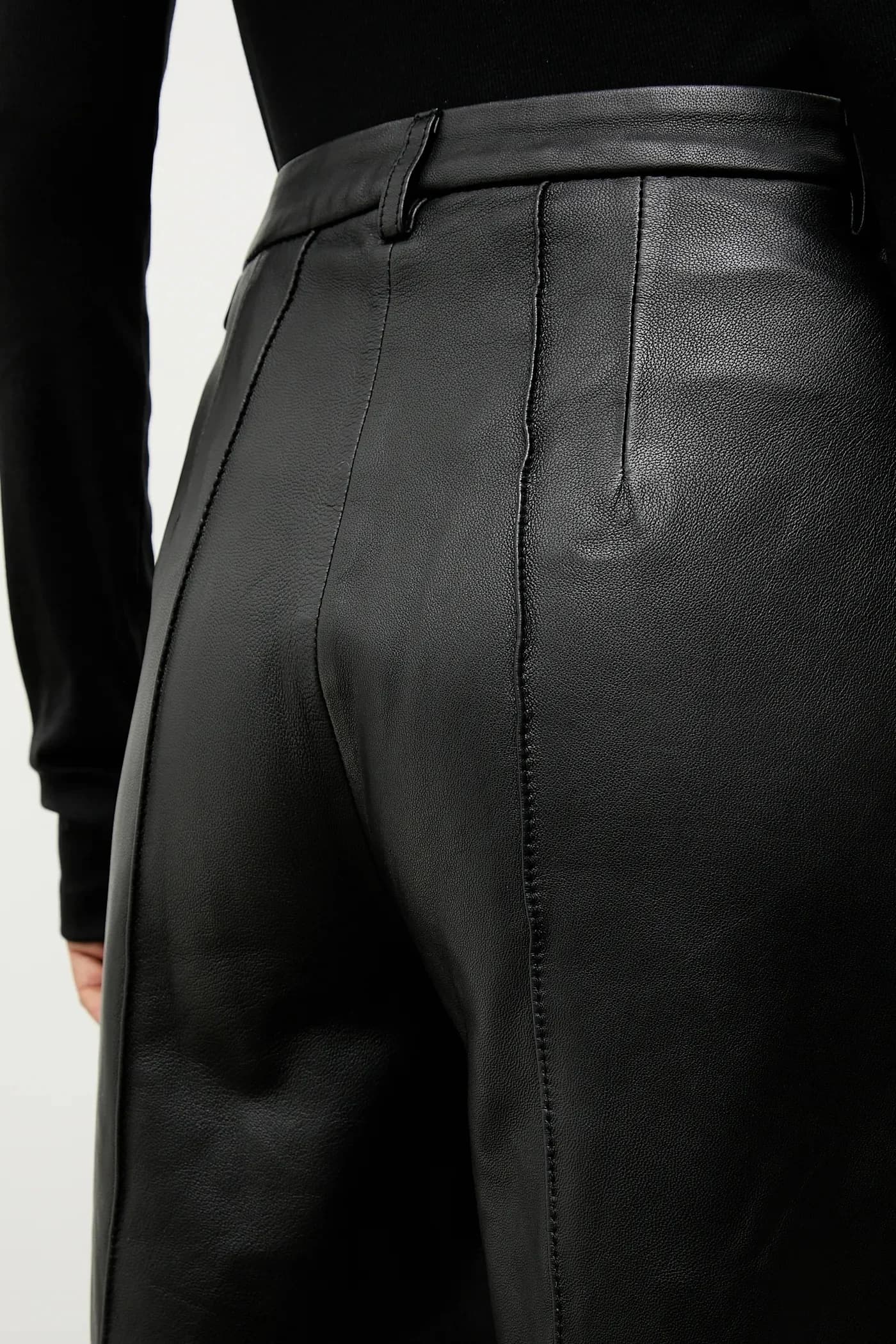 Кожаные брюки - фото 5
