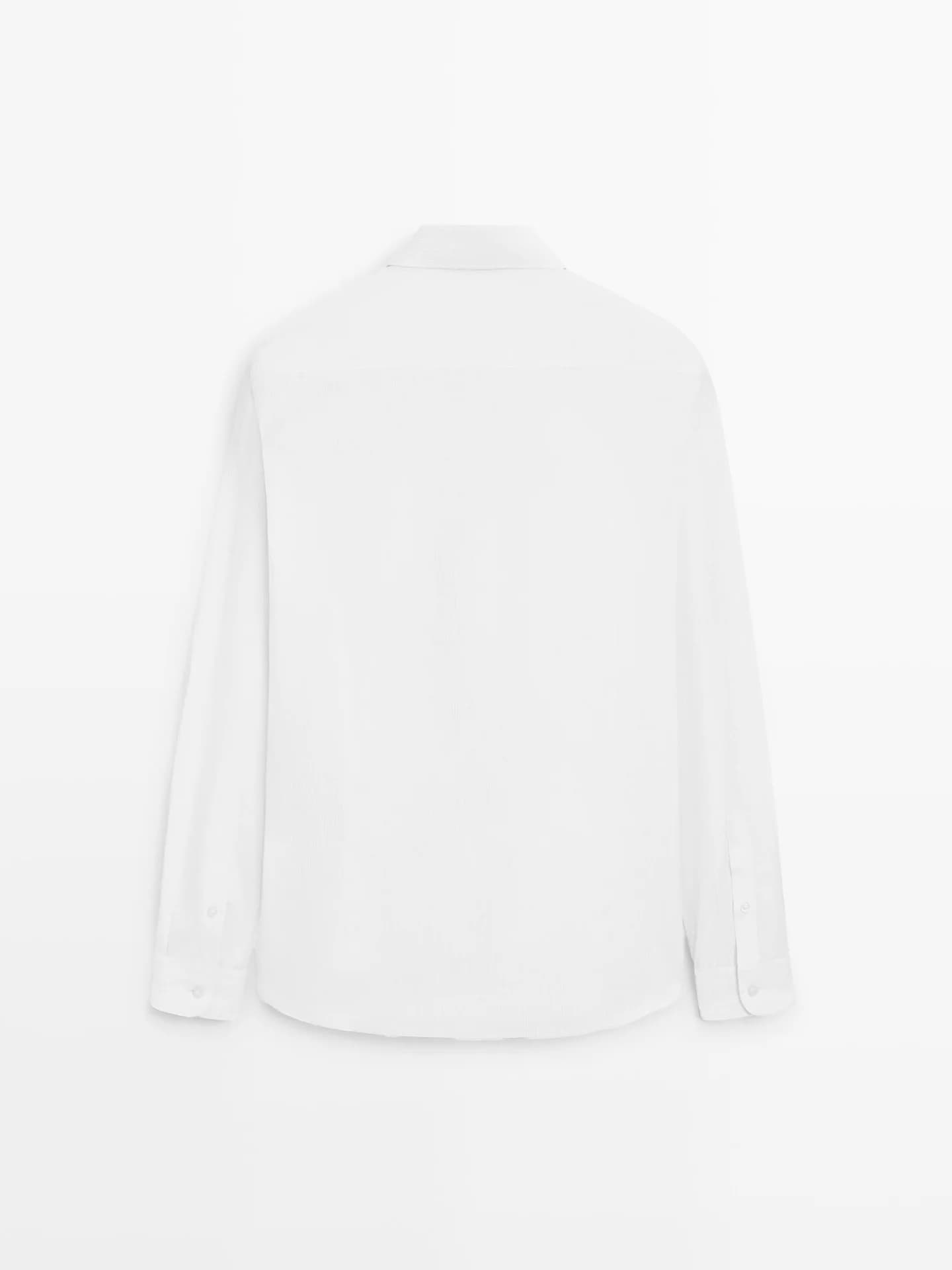 Рубашка приталенного кроя из 100% хлопкового поплина.