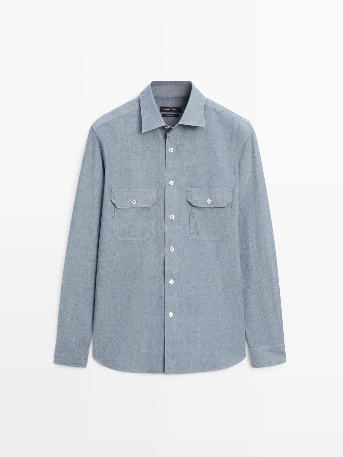 Джинсовая рубашка стандартного кроя с карманами.