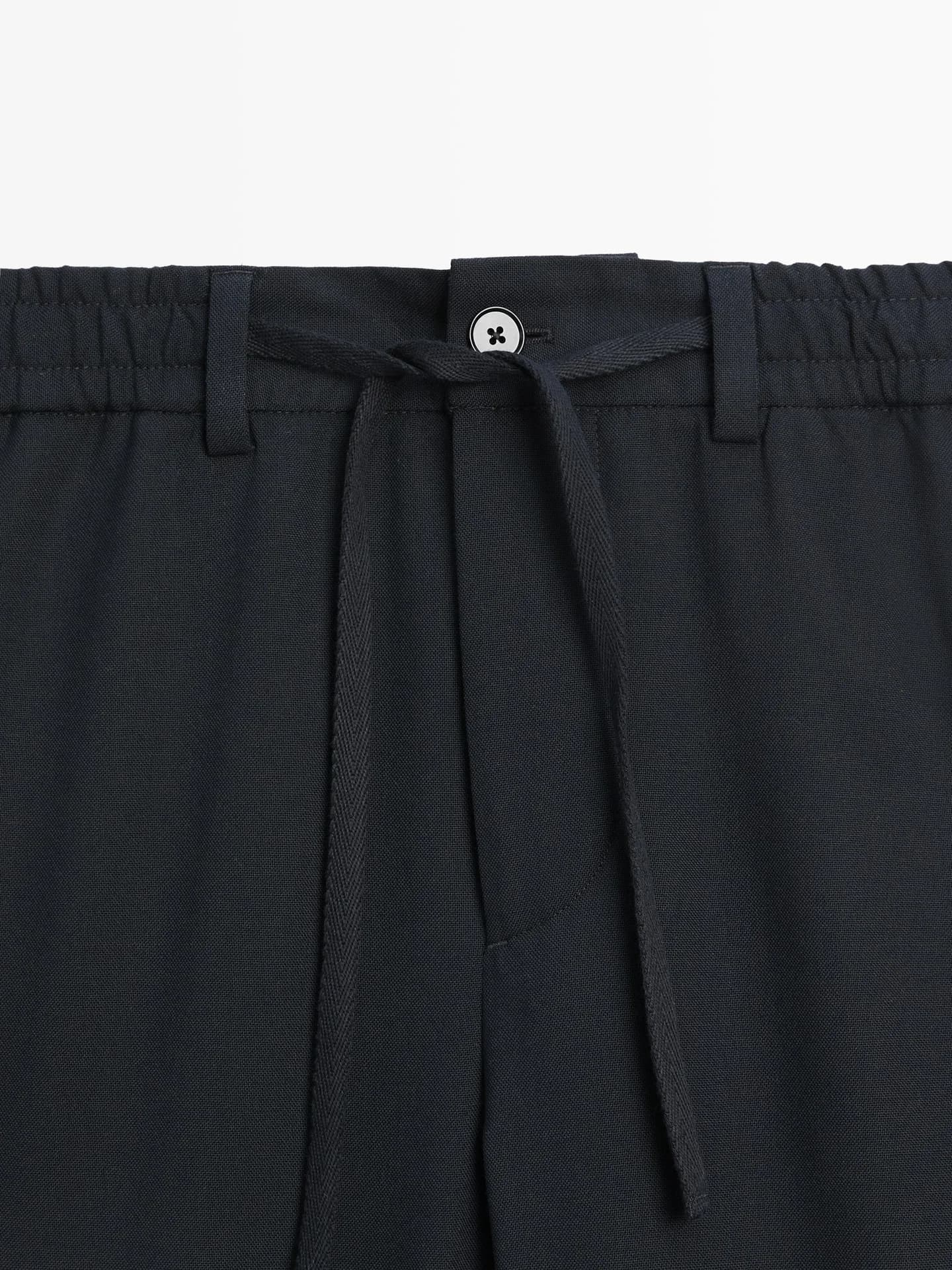 Брюки из прохладной текстурированной шерсти. - фото 6