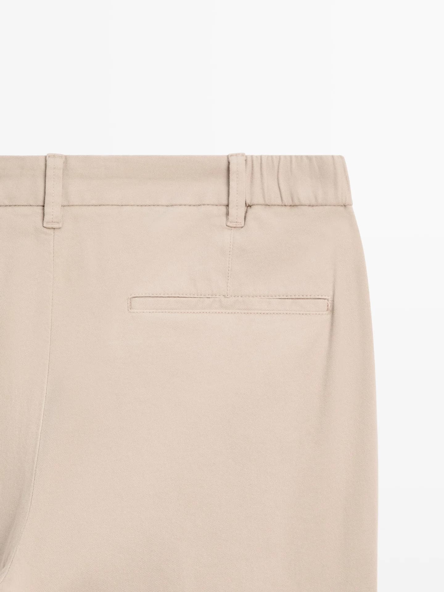 Узкие брюки из смесового хлопка.