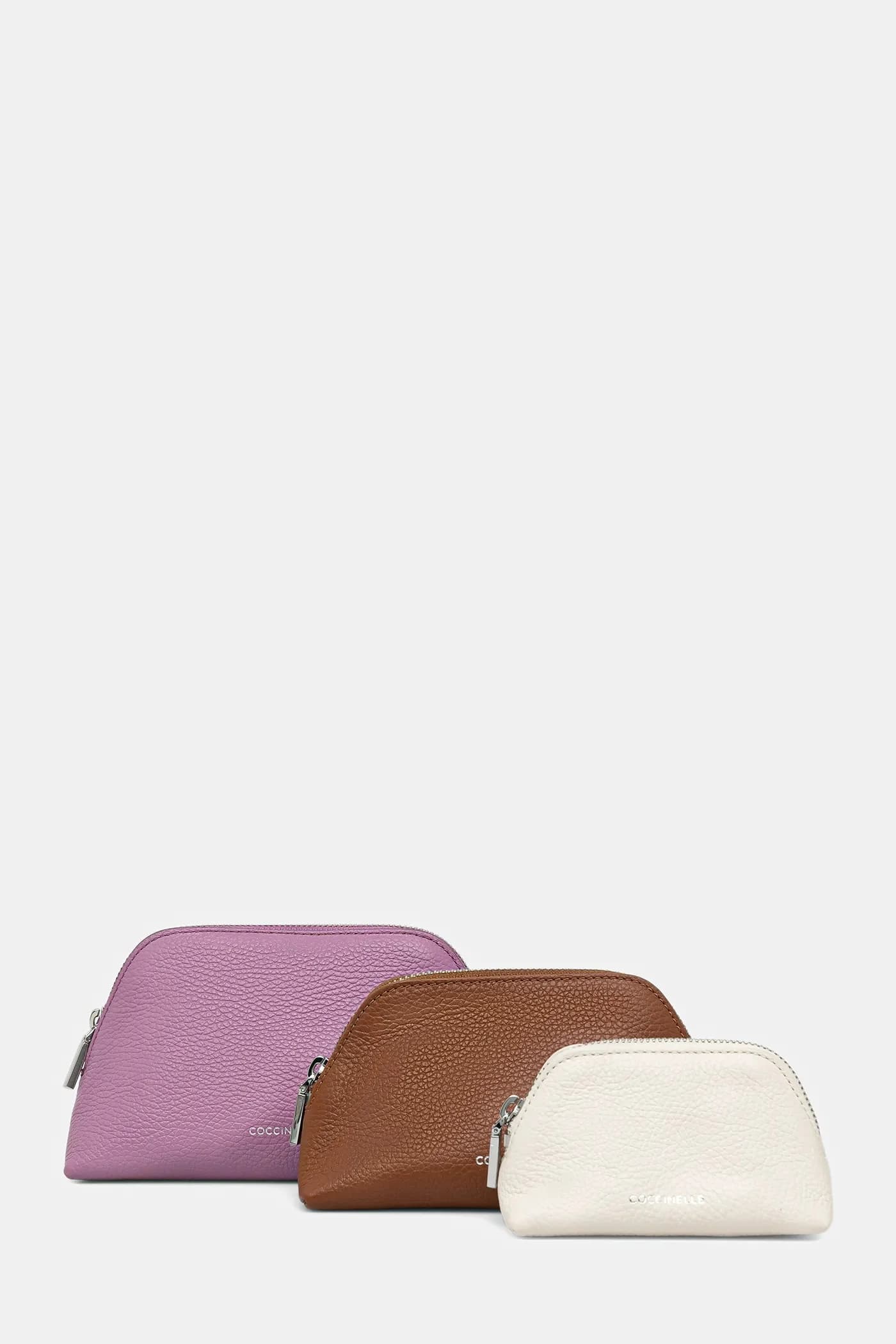 Кожаная косметичка из трех штук