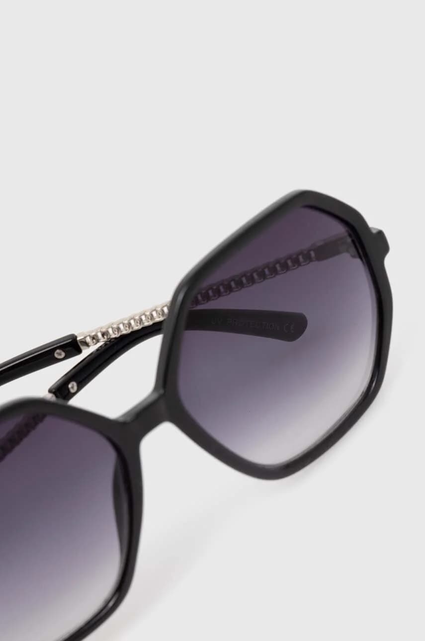 Солнцезащитные очки - фото 3