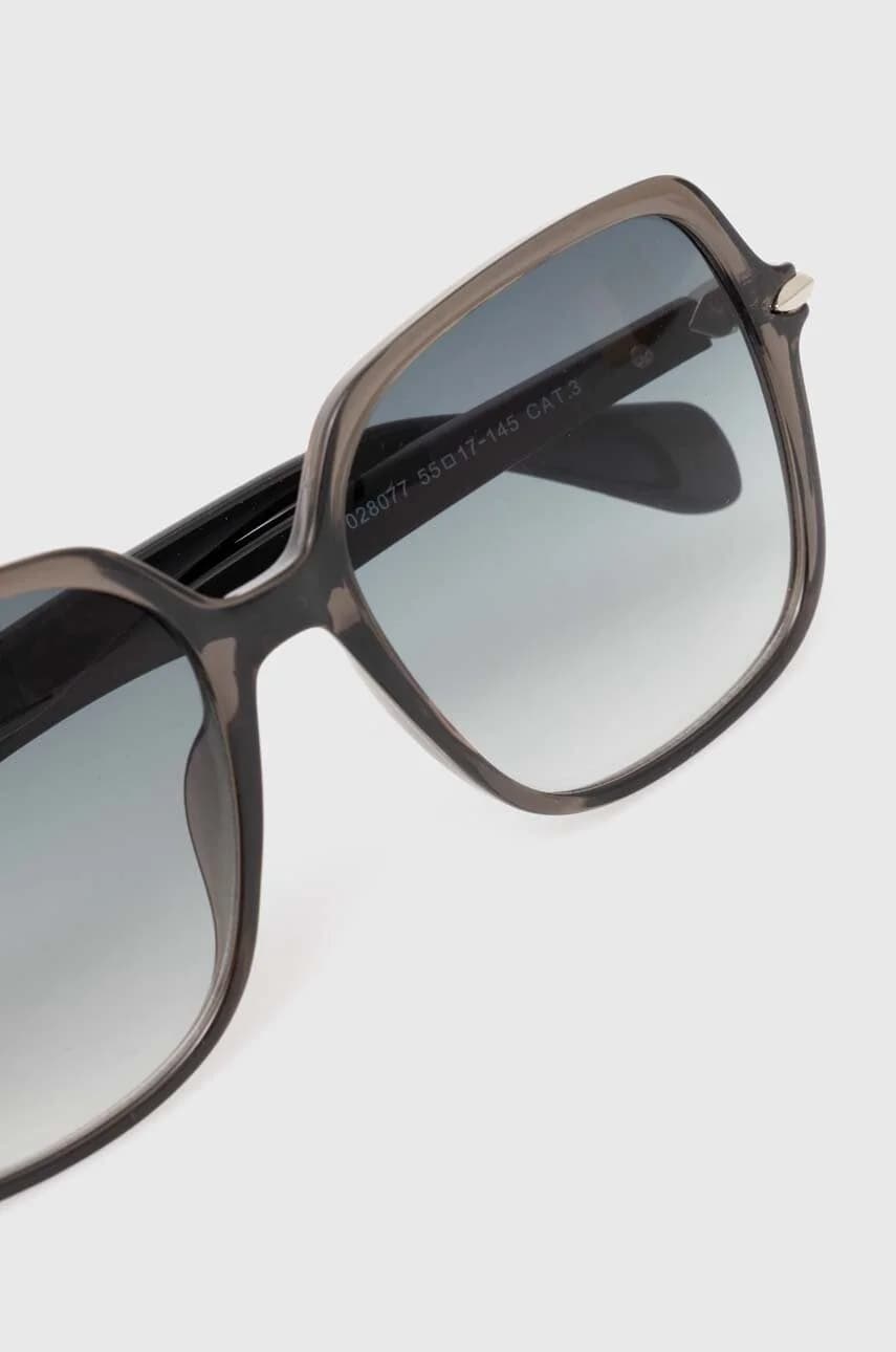 Солнцезащитные очки - фото 3