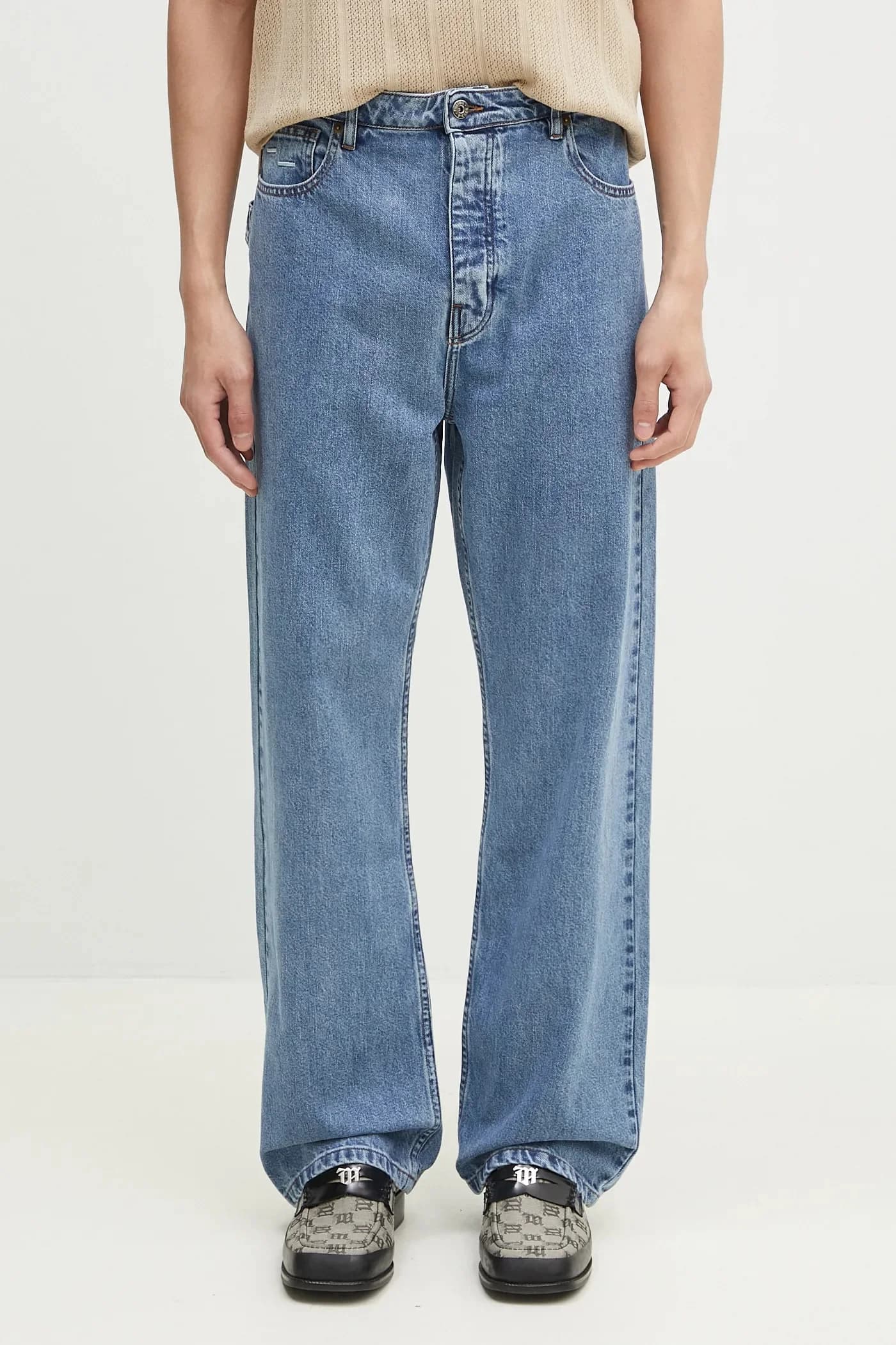 Джинсы из денима