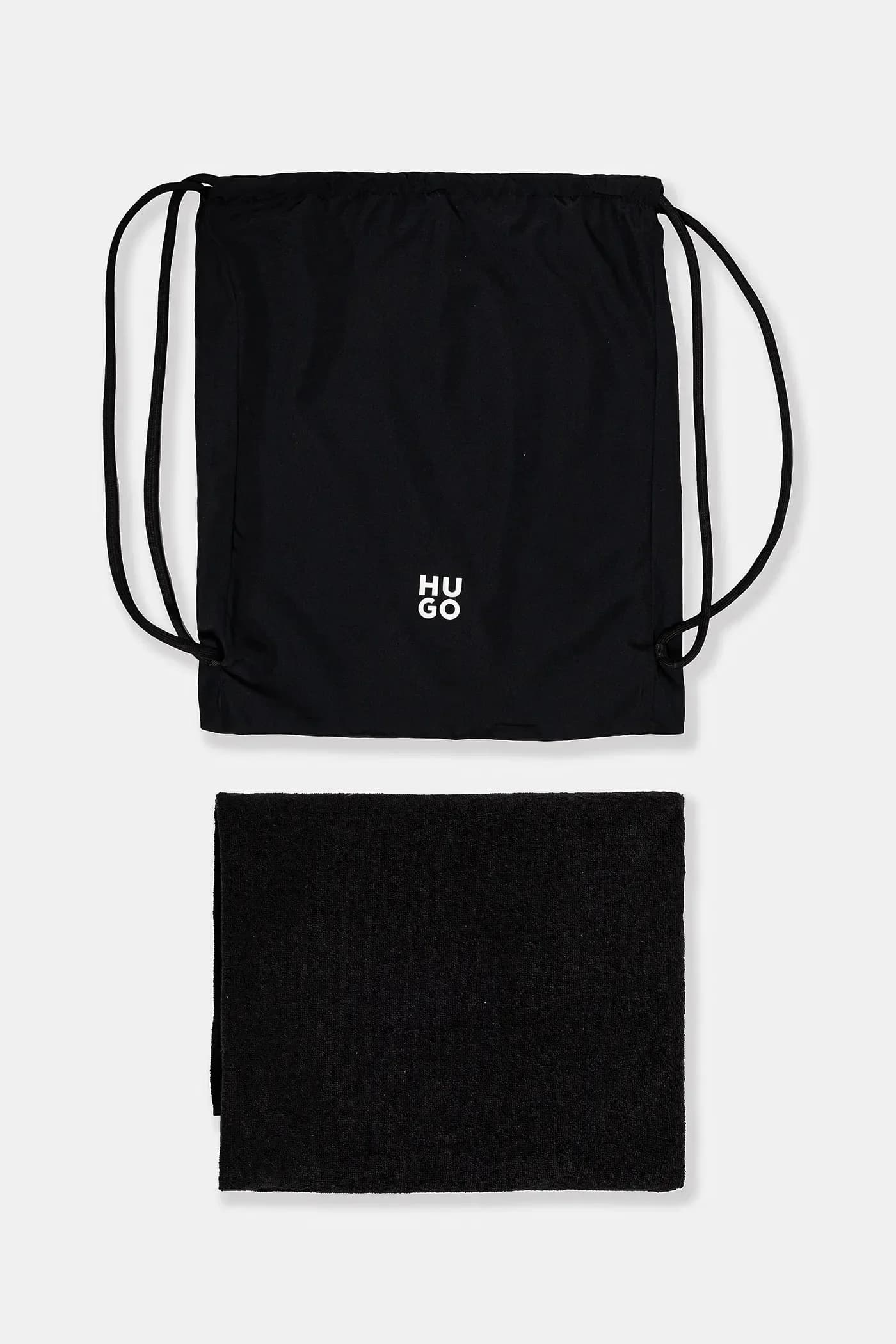 Плавательные шорты и полотенце