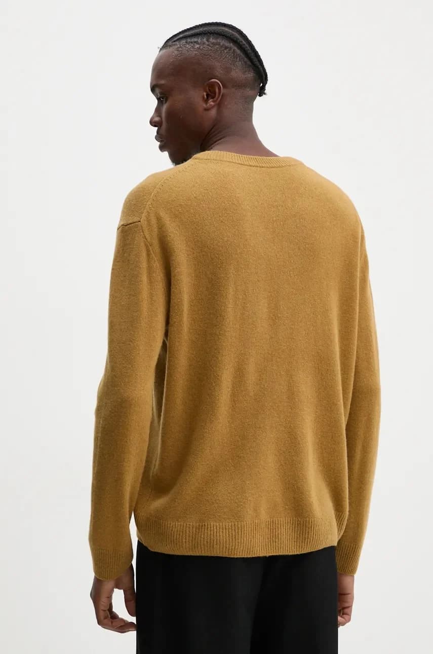 Вытянуть шерстяной свитер - фото 3