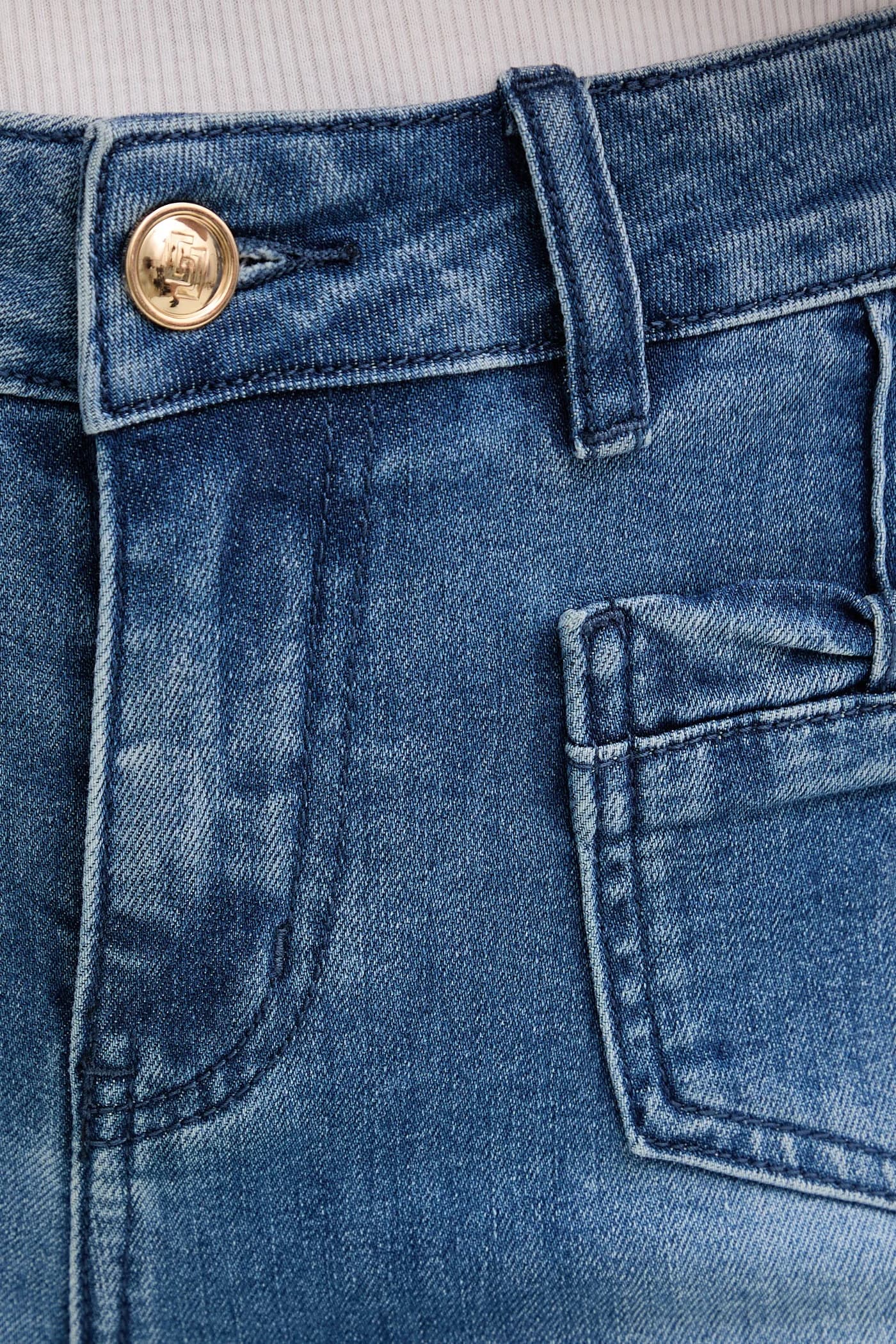 Женские джинсы-клеш - фото 5