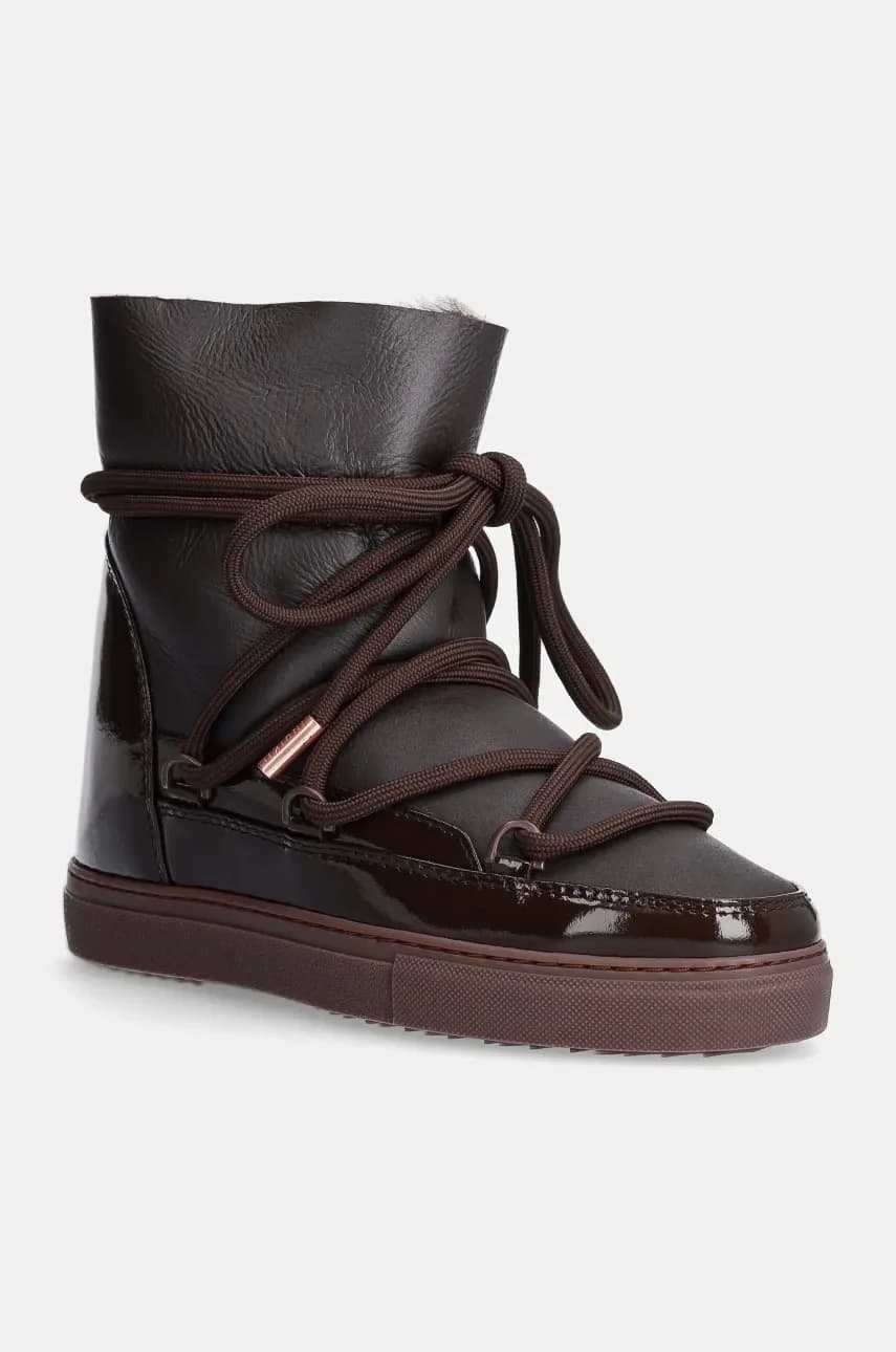 Зимние ботинки из блестящей кожи на танкетке