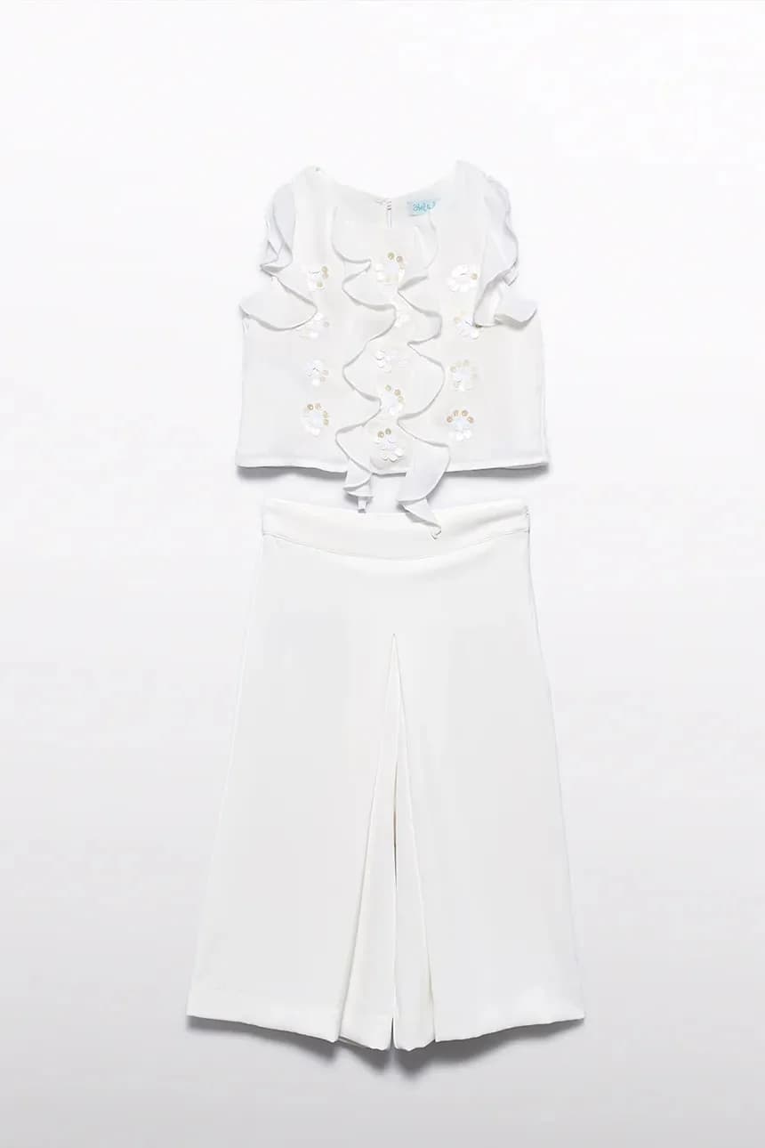 Детский комплект - блузка и брюки.