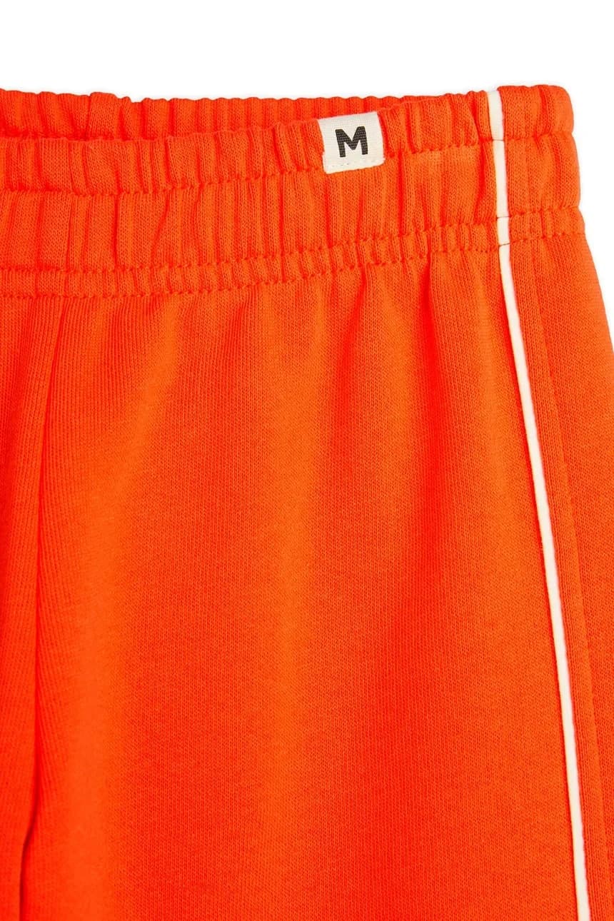 Детские спортивные штаны с однотонной окантовкой - фото 4