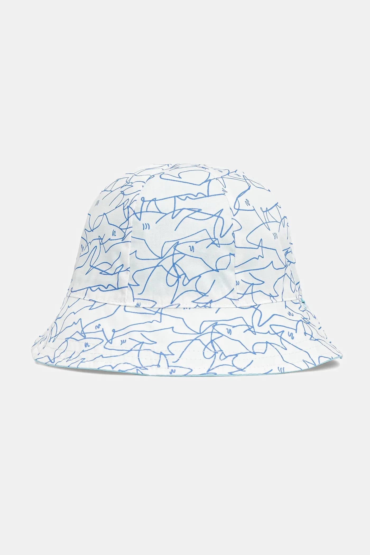 Детская двусторонняя шапка из хлопка.