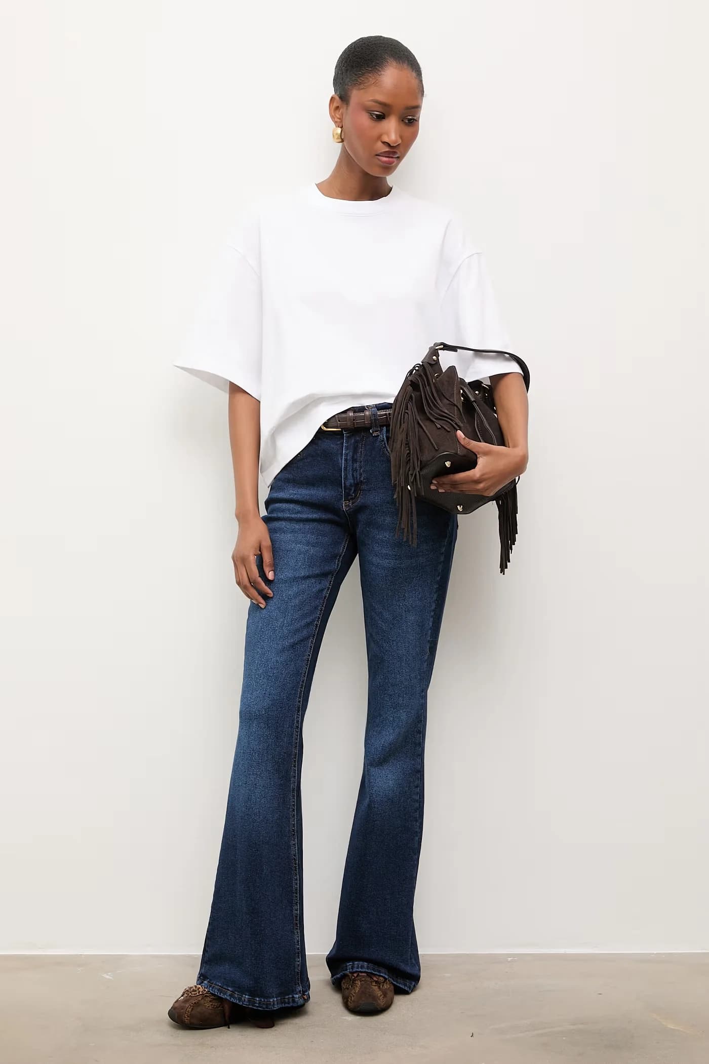 Женские джинсы-клеш - фото 2