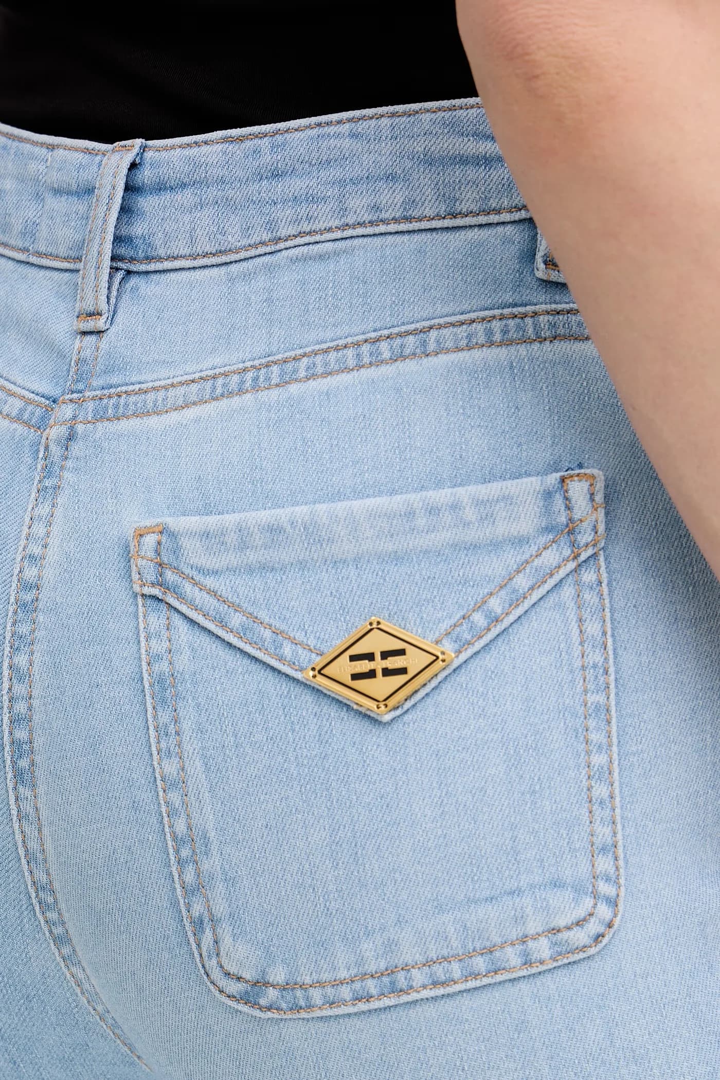 Женские джинсы-клеш - фото 4