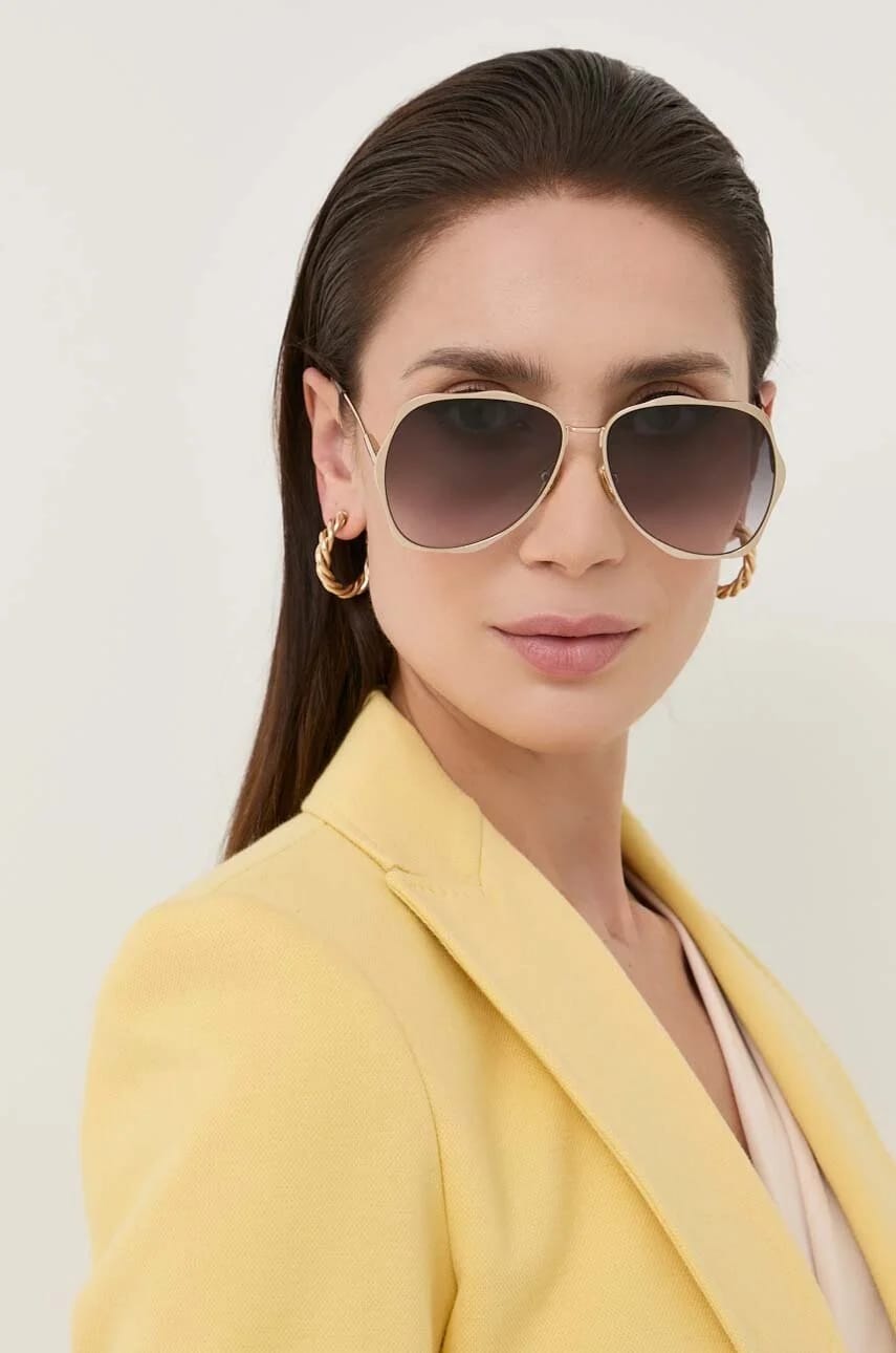 солнцезащитные очки Chloé золотые для женщин