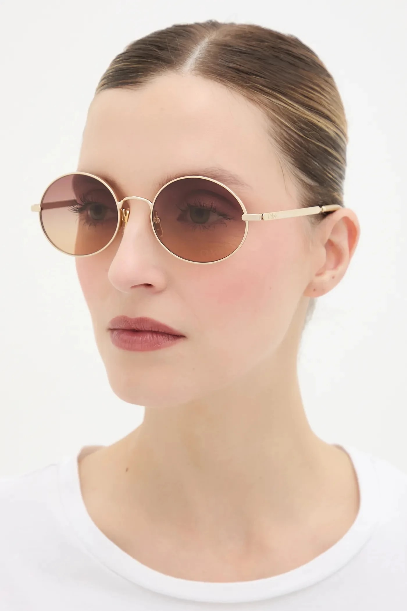 солнцезащитные очки Chloé золотые для женщин