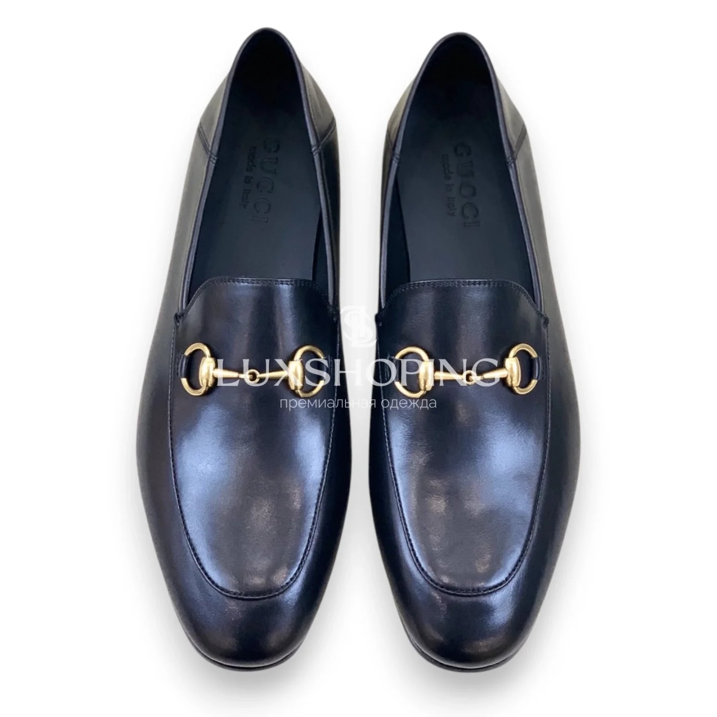 Чёрные мокасины Gucci с золотой фурнитурой