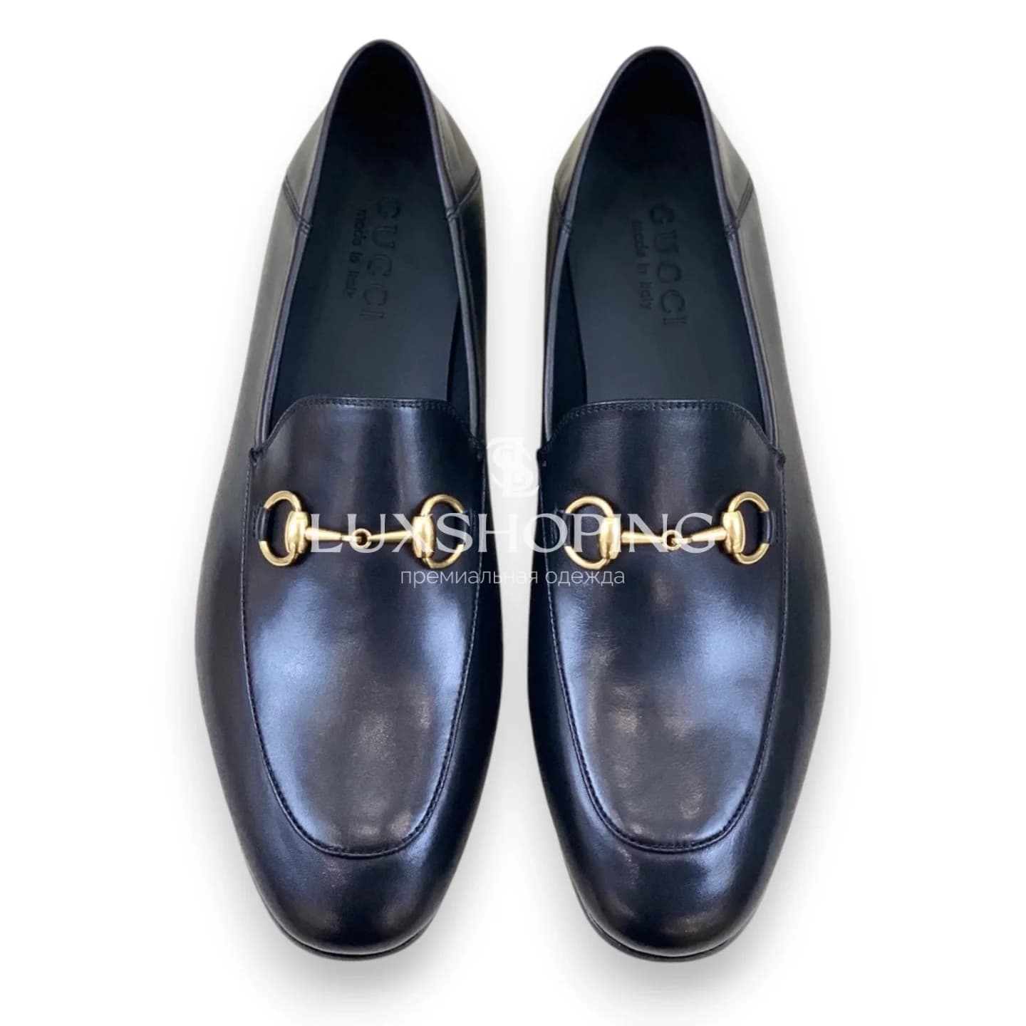 Чёрные мокасины Gucci с золотой фурнитурой