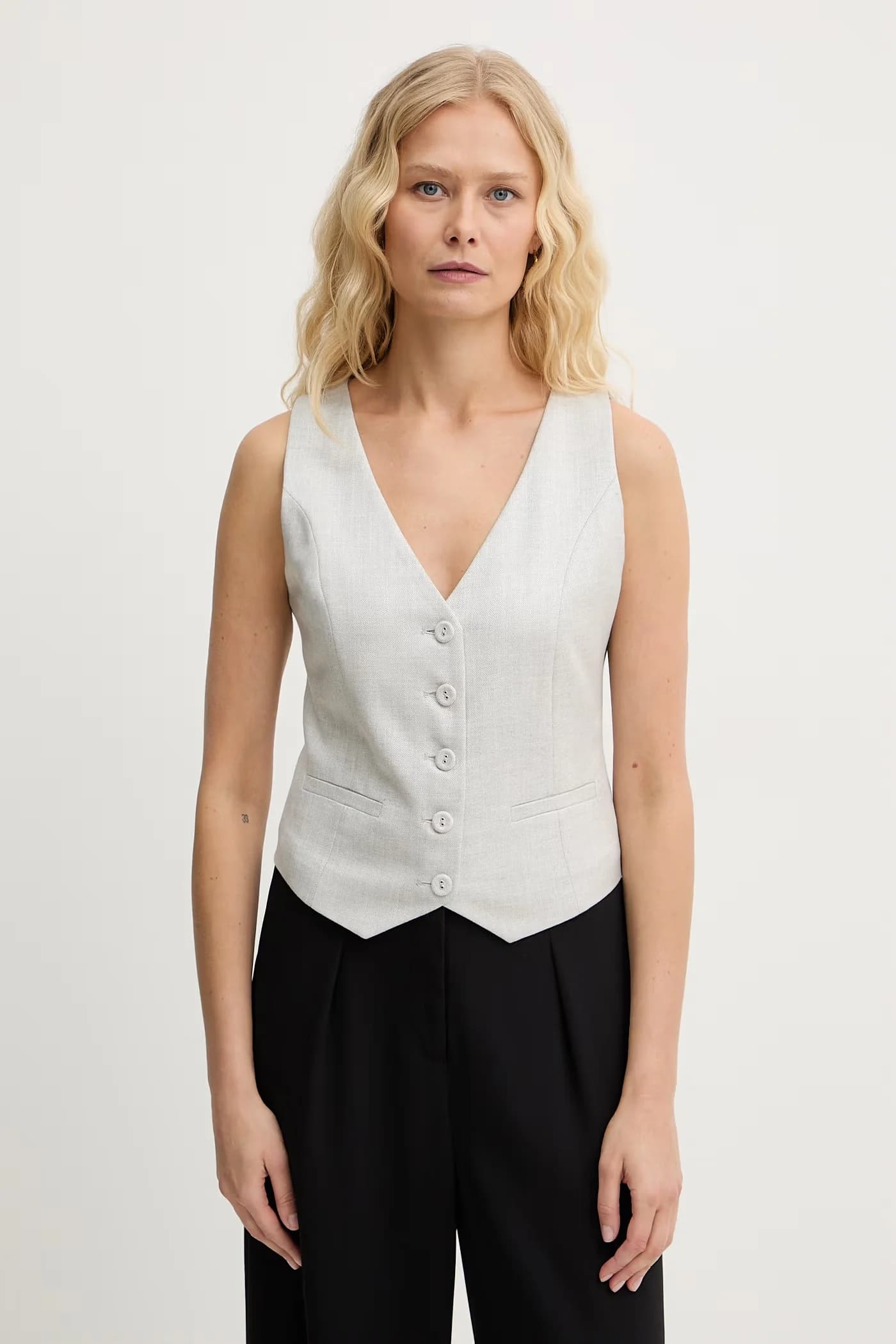 Женский однобортный жилет