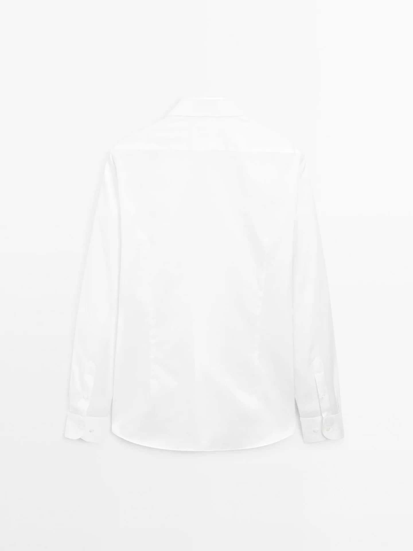 Узкая рубашка из твила из 100% хлопка.