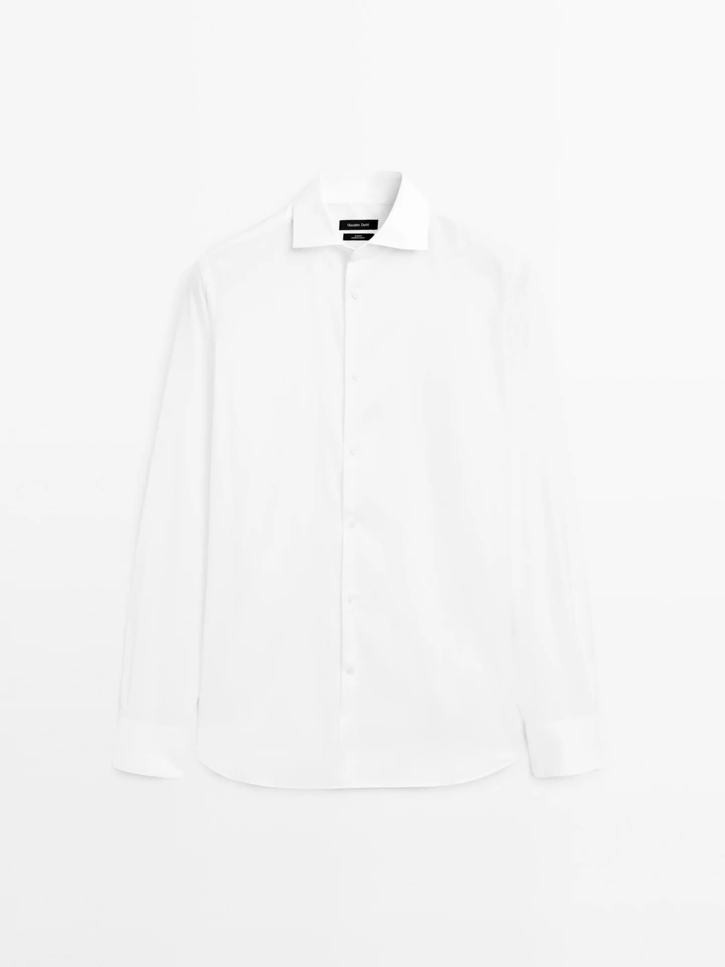 Рубашка стандартного кроя из 100% хлопка.