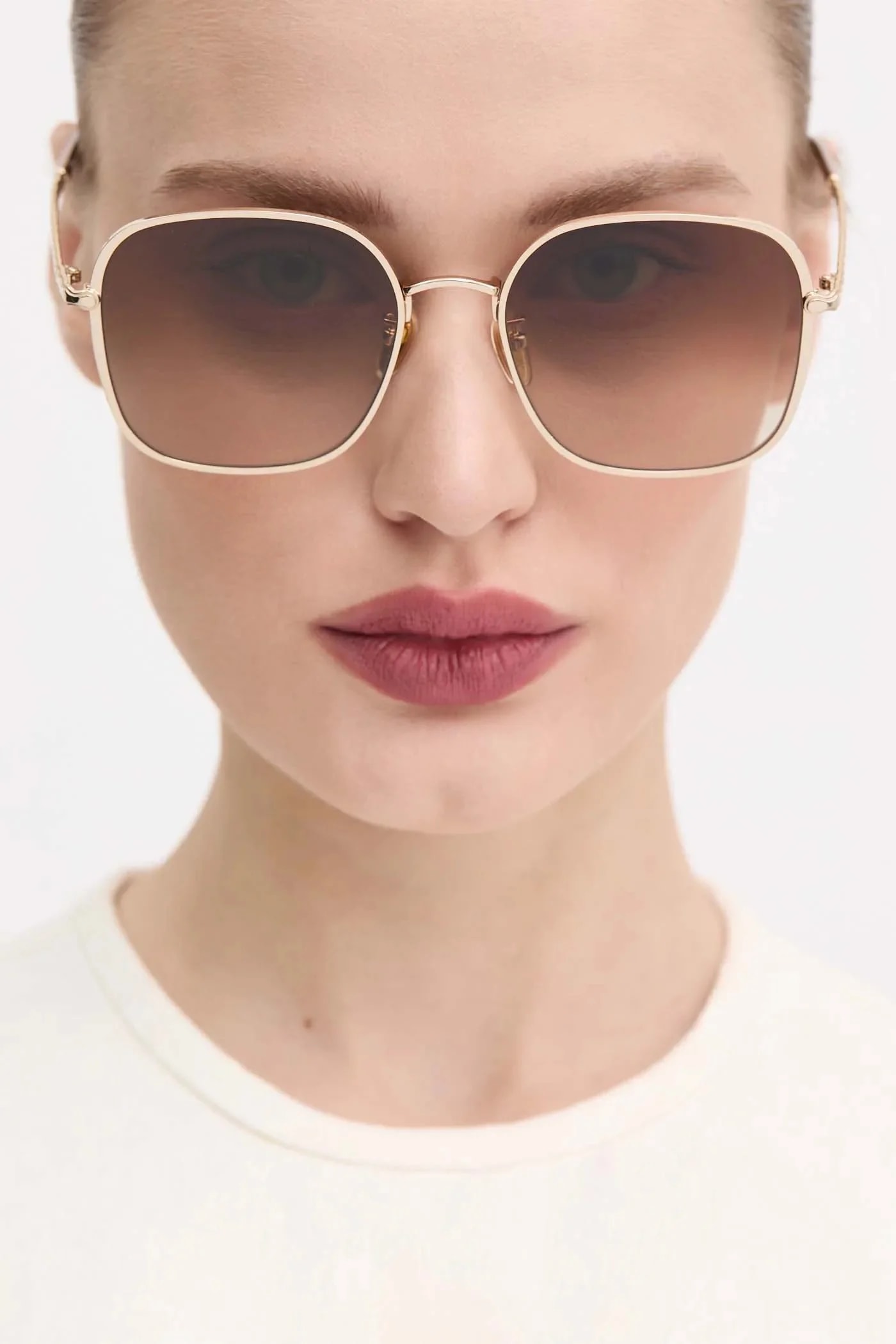 солнцезащитные очки Chloé золотые для женщин
